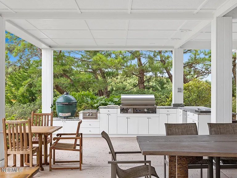 Wilmington Beach Mansion with Panoramic Views, exterior covered outdoor kitchen facing the atlantic marshes of north carolina