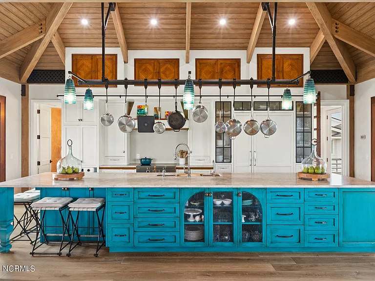 Wilmington Beach Mansion with Panoramic Views, renovated turquoise and natural wood kitchen with vaulted ceilings and exposed wood