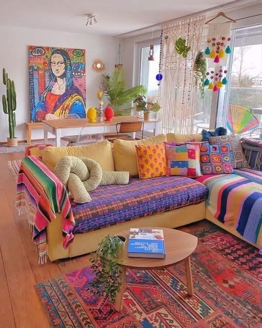 bohemian living room with multi colored throw blankets and mona lisa art, cute room ideas