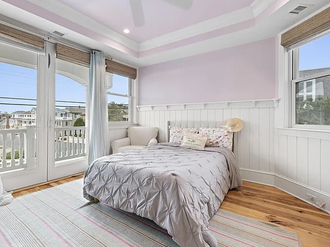 Renovated LBI Beach Mansion, interior of 6601 Ocean Blvd, interior guest bedroom with nautical design facing the atlantic ocean