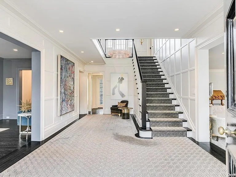 Locust Valley New York mansion, interior modern foyer and staircase