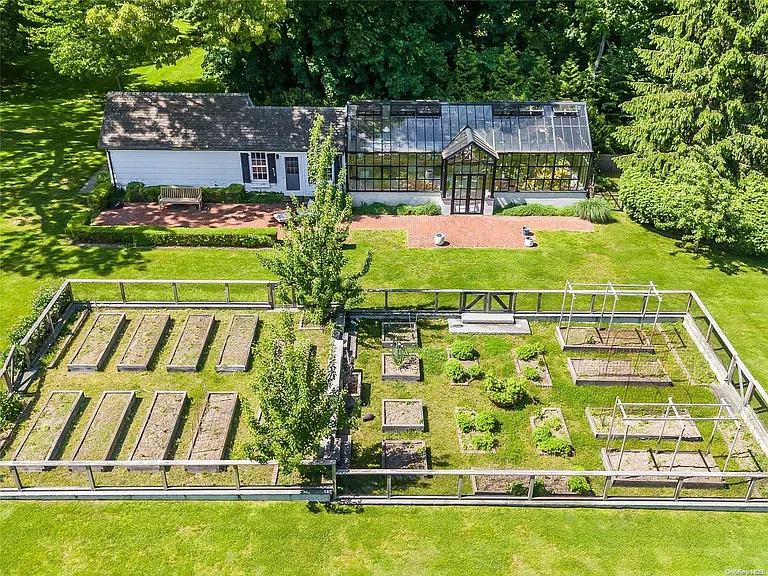 Locust Valley New York mansion, exterior aerial view of garden and greenhouse